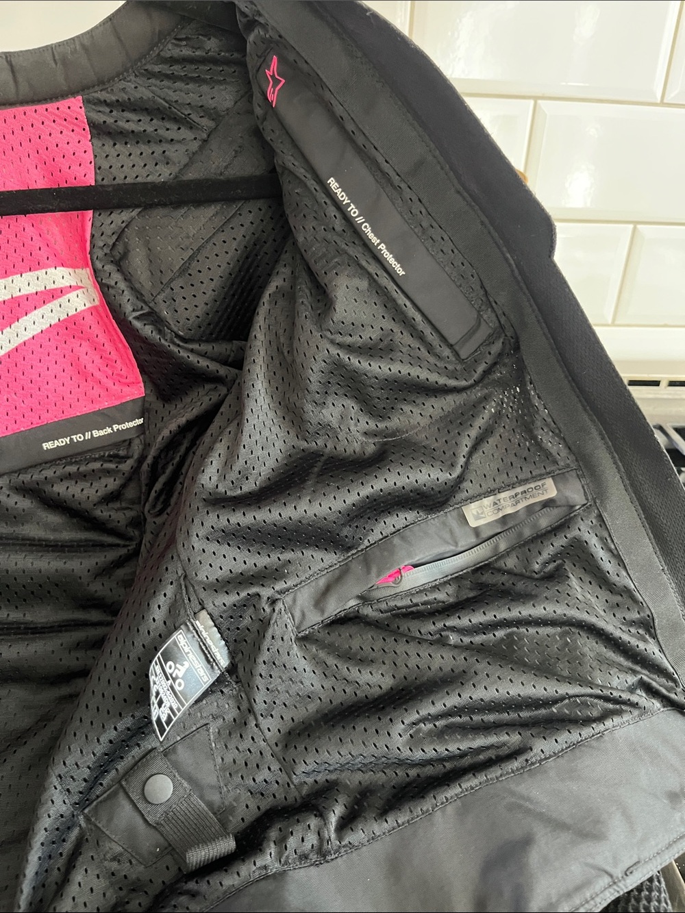 Alpinestars Black Motorcycle Jacket with Pink Liner Accent - Picture 4 of 6